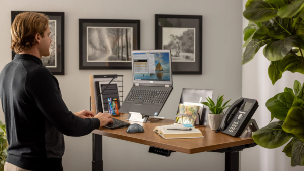 A modern ergonomic laptop stand setup in a home office